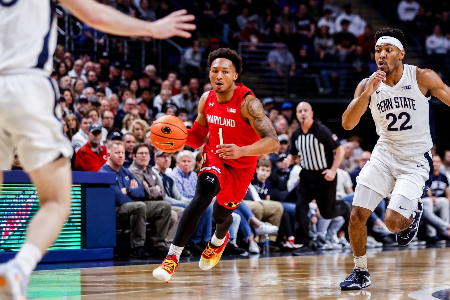 Maryland basketball guard Jahmir Young dribbles the ball down the court vs. Penn State