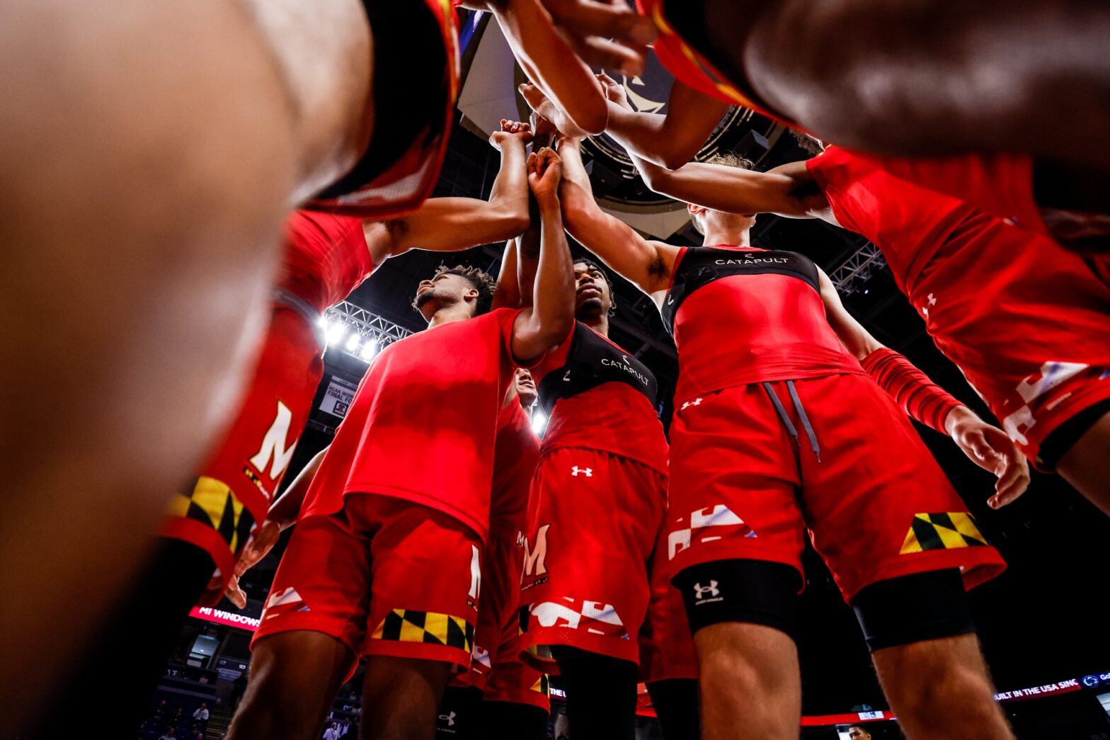 Maryland basketball huddles before the Penn State game